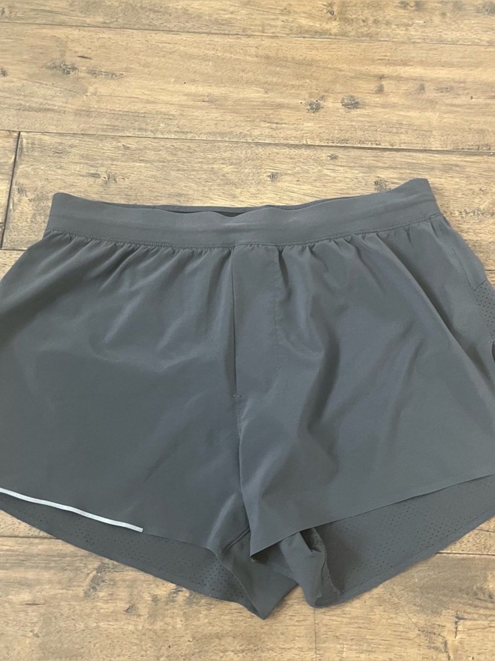 Grey Woman’s Lululemon workout shorts